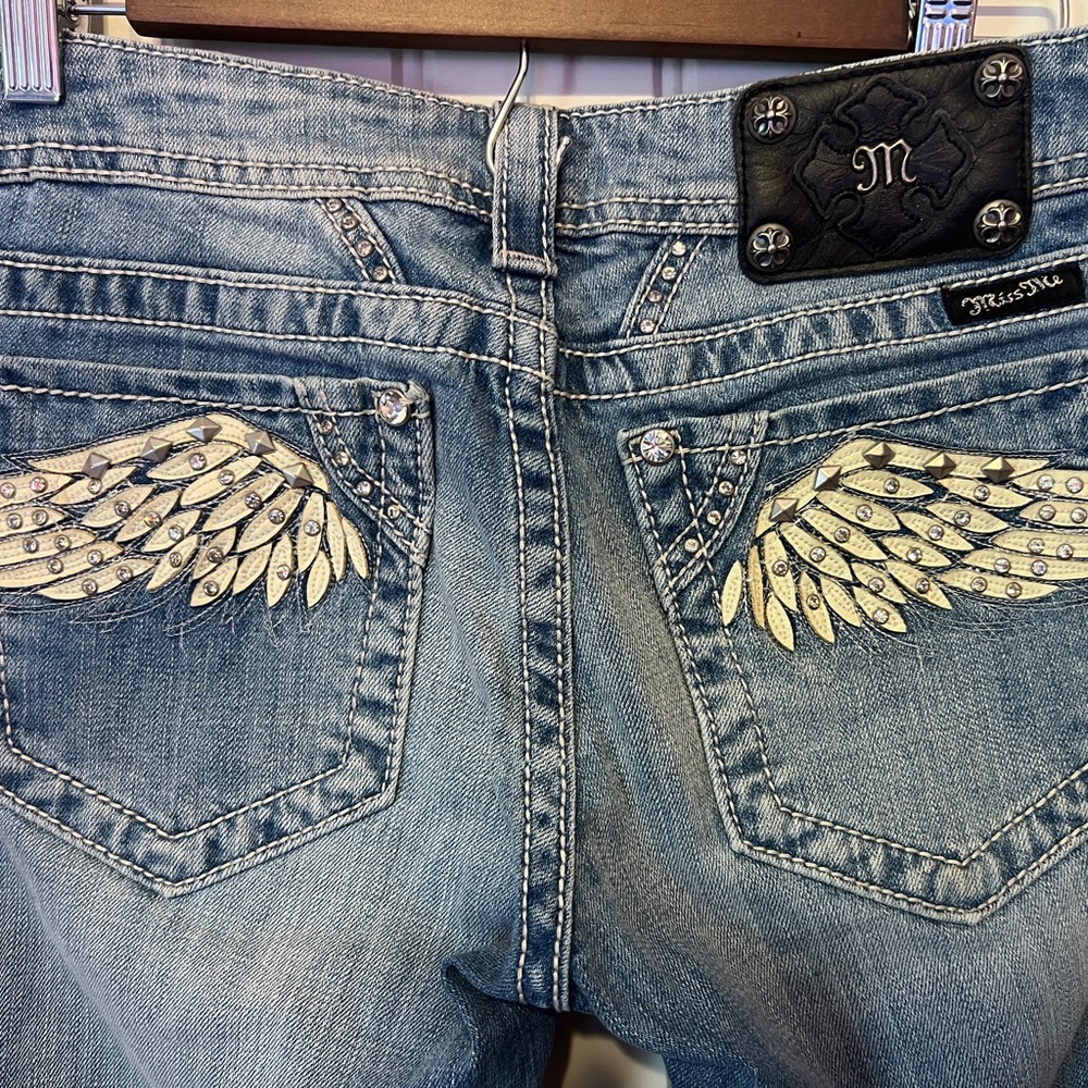 Miss Me Blue Jeans with Wing Embellishments